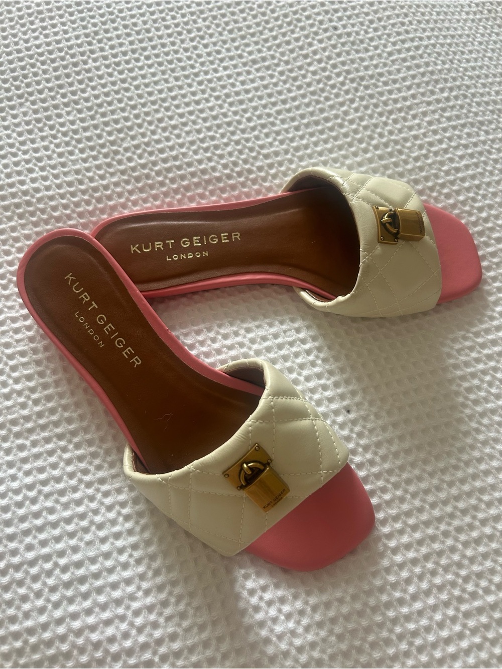 Kurt Geiger Cream Quilted Slide Sandals with Pink Sole and Gold Accent